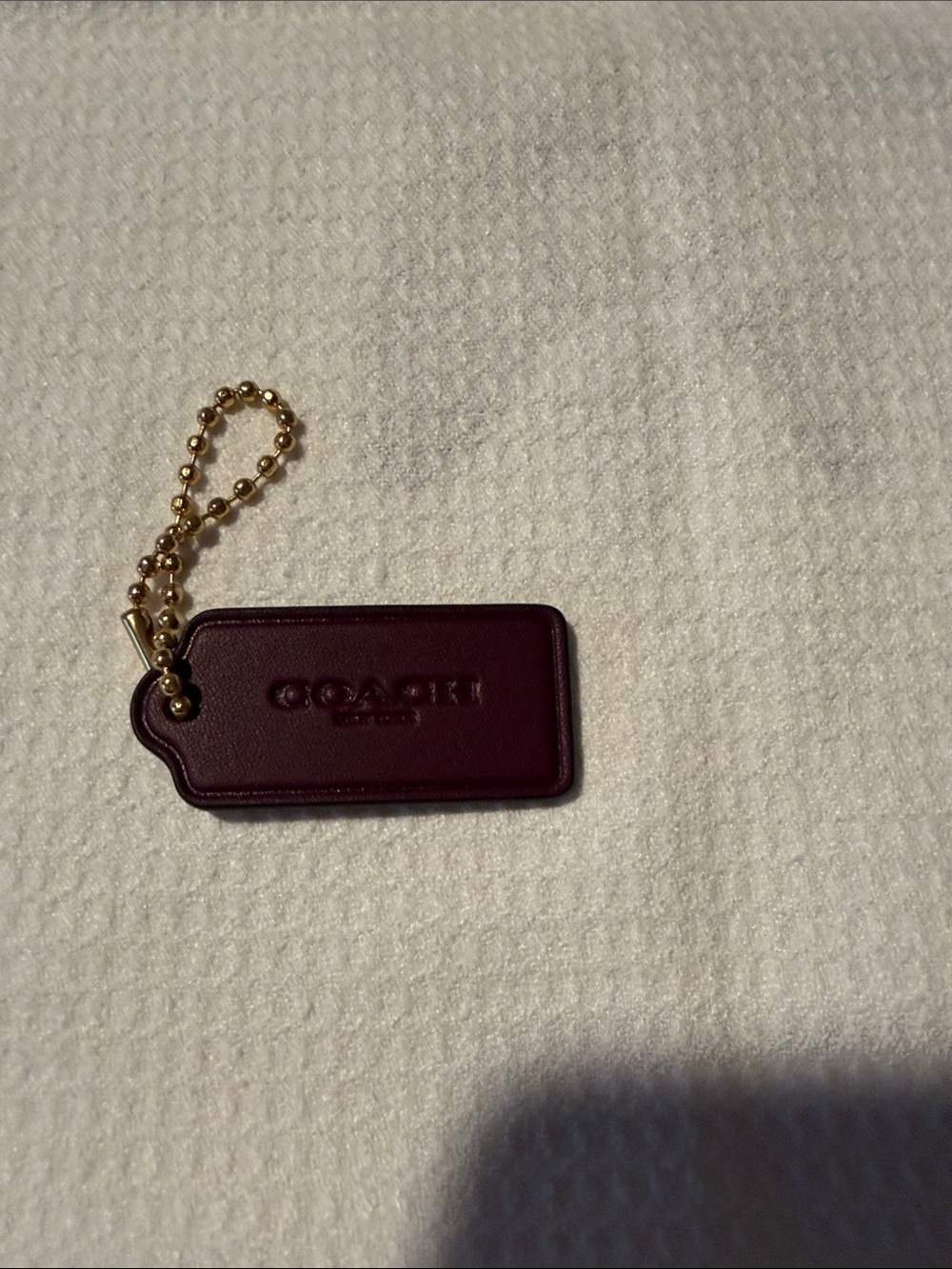 Coach Burgundy Leather Tag with Gold Ball Chain